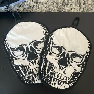 Pair - skeleton pot holders